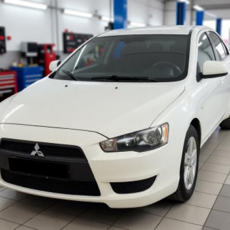Митсубиси Лансер после техобслуживания в автотехцентре